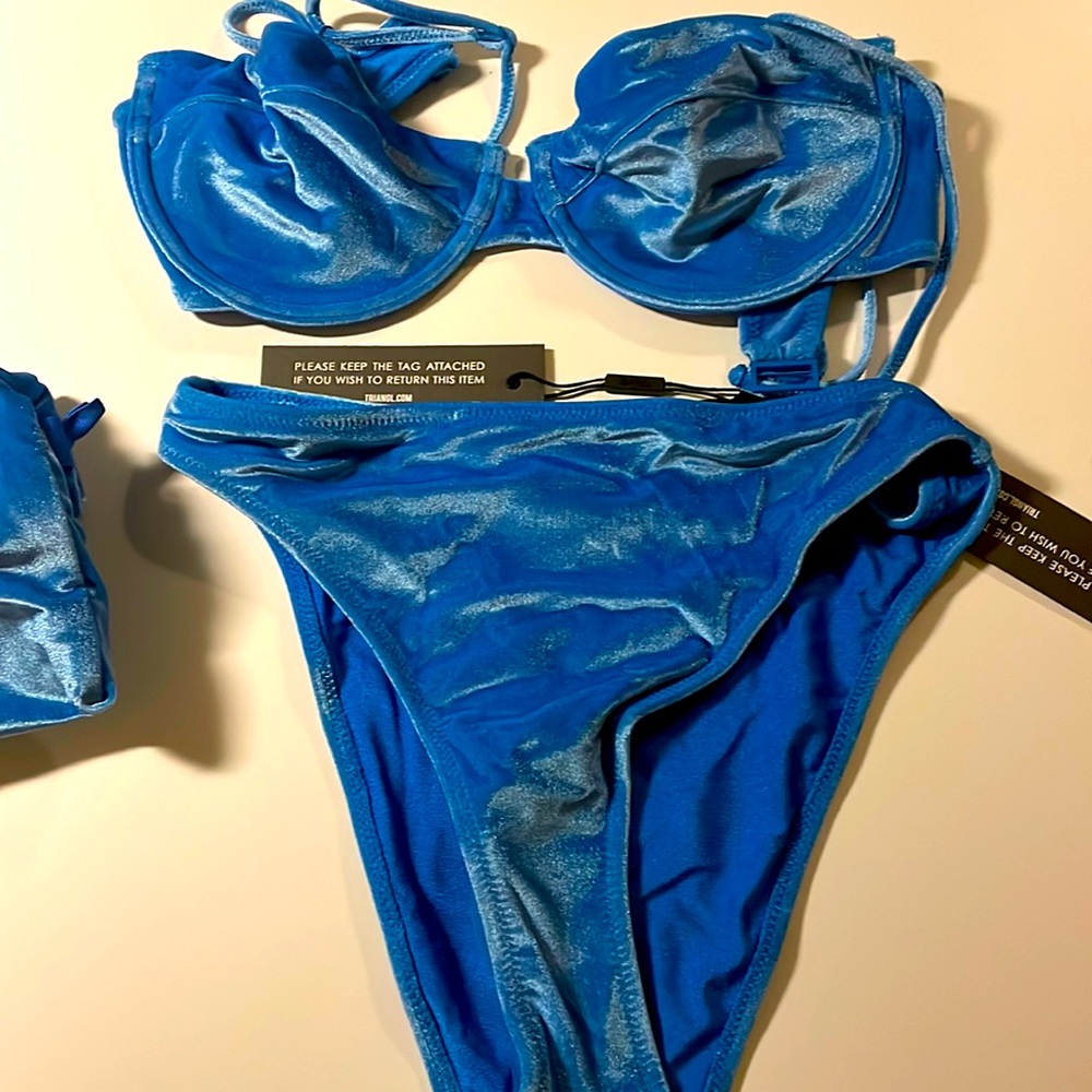 Triangle Brand New with Tags.  Small ++ top and small bottoms